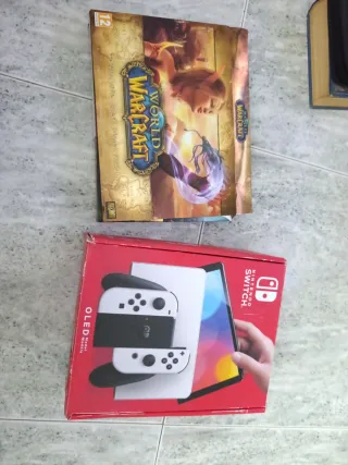 Nintendo Switch OLED caja  + World of Warcraft