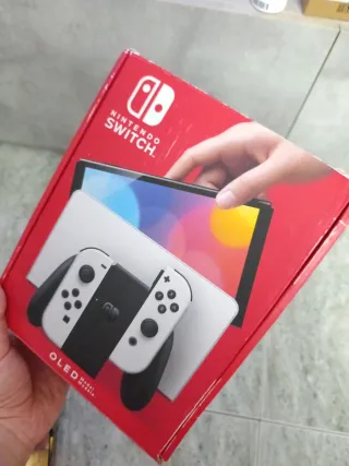 Nintendo Switch OLED caja  + World of Warcraft