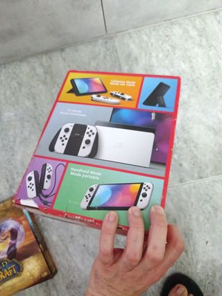 Nintendo Switch OLED caja  + World of Warcraft