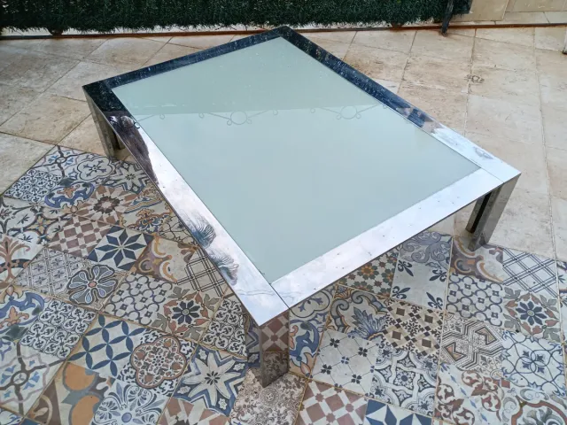 Mesa de centro de diseño en acero cromado años 80s
