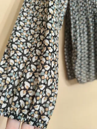Blusa estampada manga larga