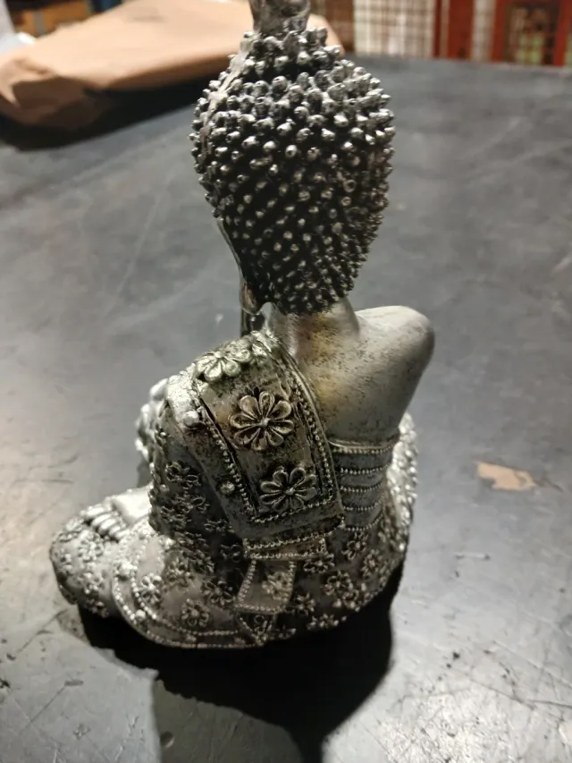 Statua Buddha con portacandele