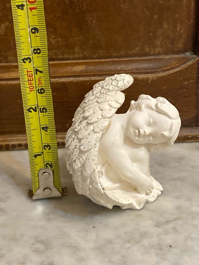 Angelo resina dormiente con ali glitterate