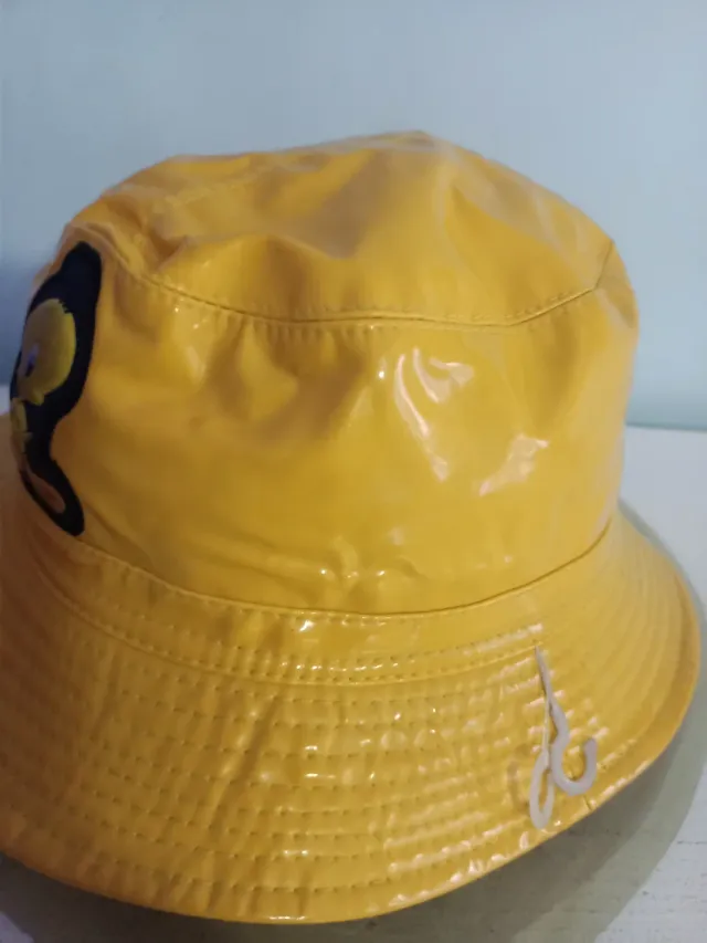 Gorro de lluvia amarillo infantil