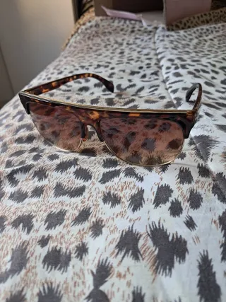 Occhiali da sole tartarugati e oro