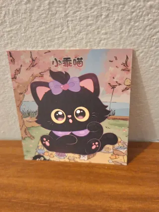 Figurina gatto nero con fiocco