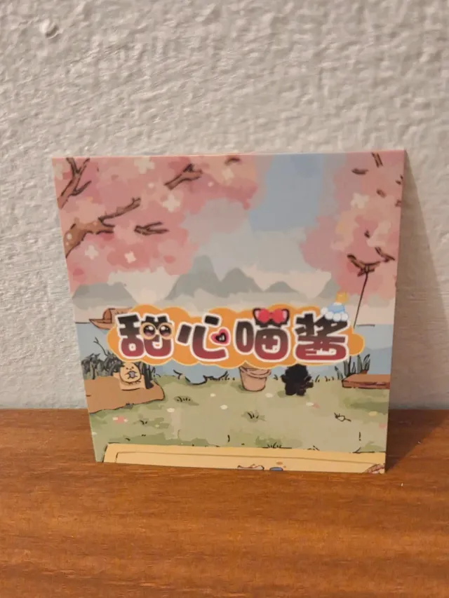 Figurina gatto nero con fiocco