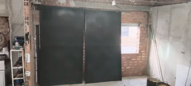 Puerta cochera hierro con marco