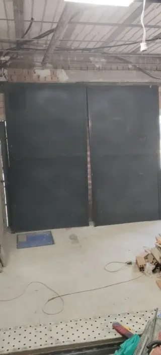 Puerta cochera hierro con marco