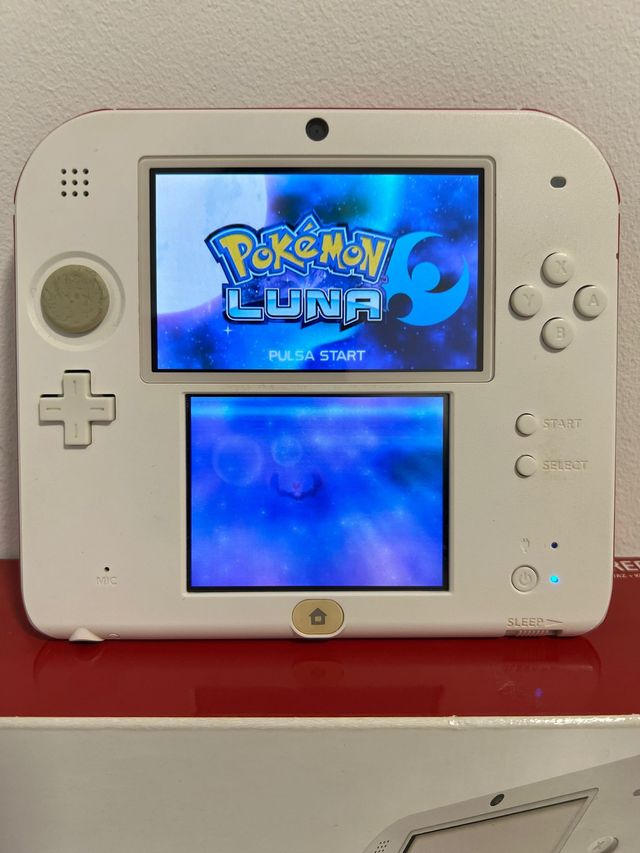 Nintendo + Pokemon Luna + 7 Juegos + caja