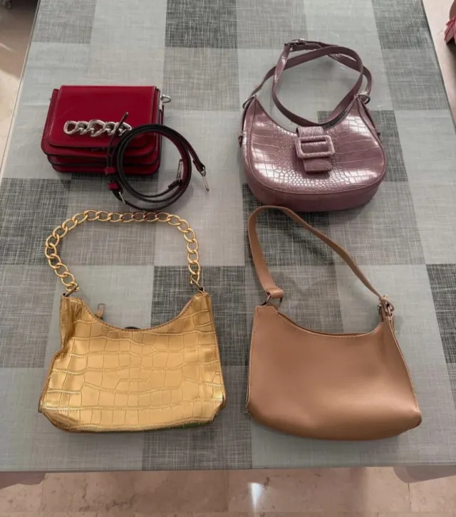 Lote 4 bolsos: dorado, rojo, lila y beige