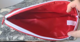 Pochette portaoggetti Colgate rossa