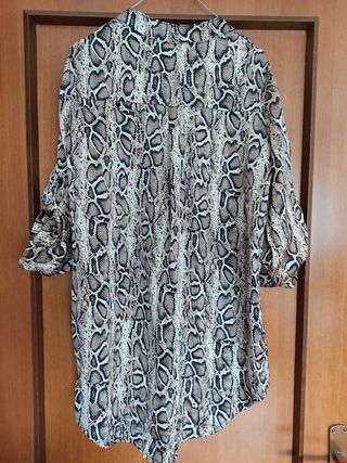 Blusa lunga morbida con maniche