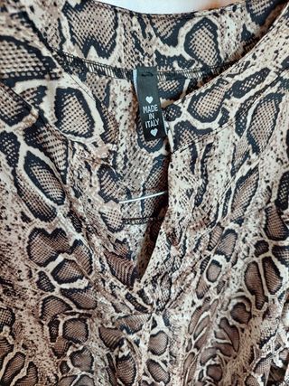 Blusa lunga morbida con maniche