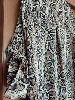 Blusa lunga morbida con maniche