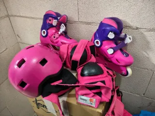Patines y equipo de protección infantil rosa