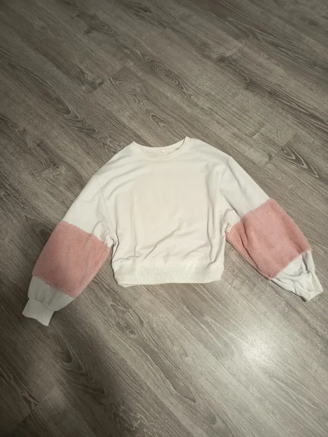 Jersey blanco puños pelo rosa