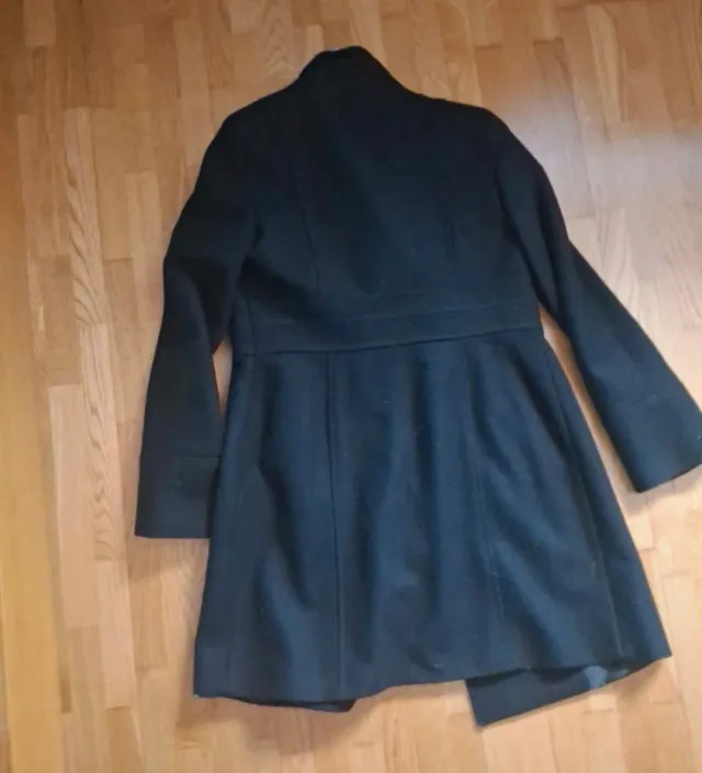 Abrigo negro de vestir