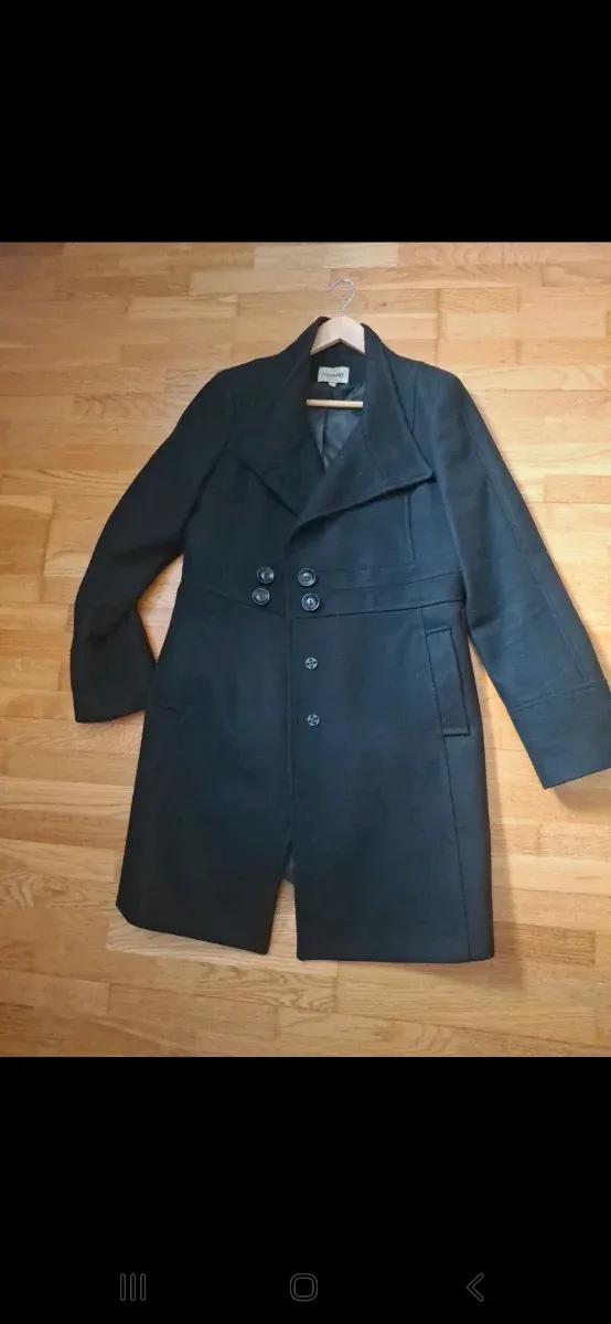 Abrigo negro de vestir