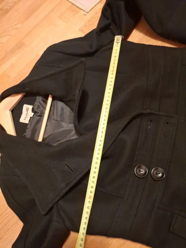 Abrigo negro de vestir