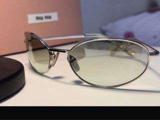 Gafas de sol Prada plateadas y verdes