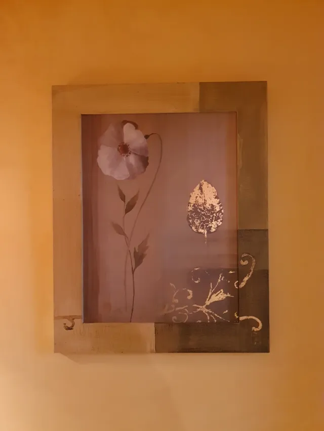 Cuadro decorativo flor y hoja.
