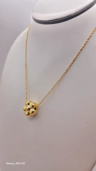 Colgante y cadena de oro 18K