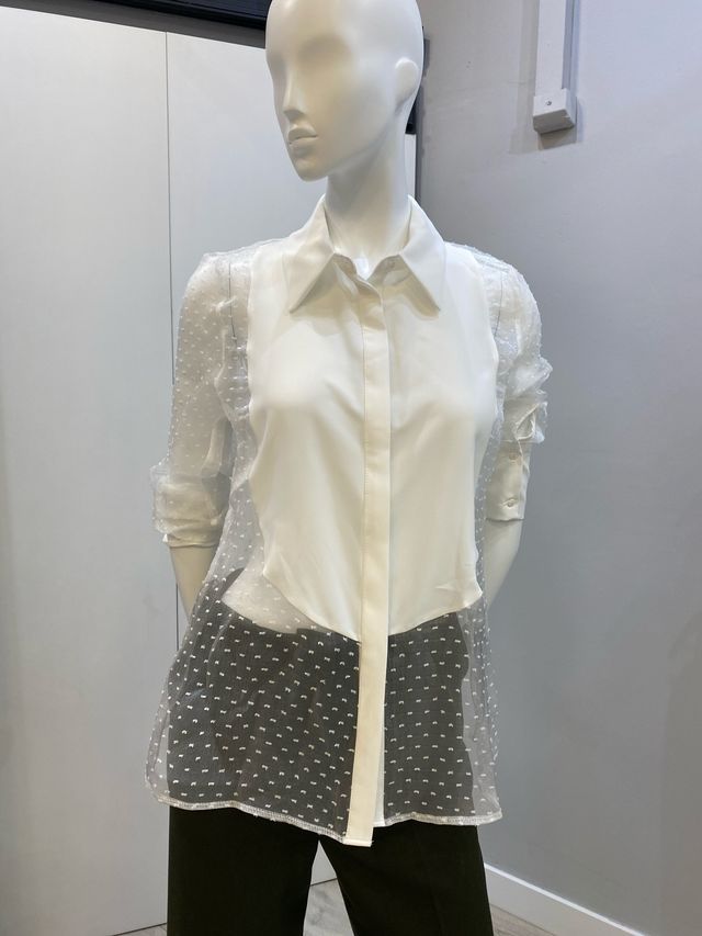 Blusa blanca elegante plumetti