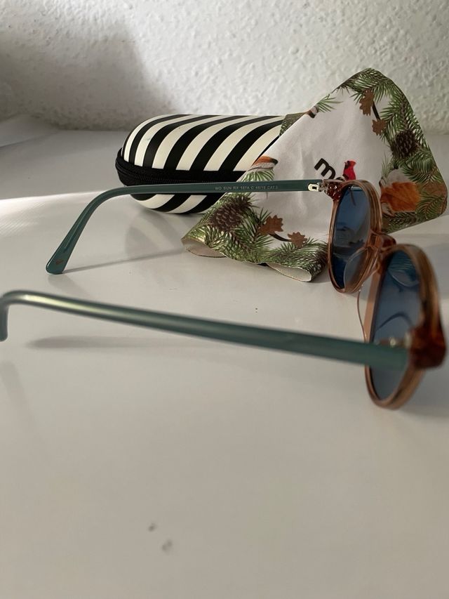 Gafas de sol mo azules y marrones