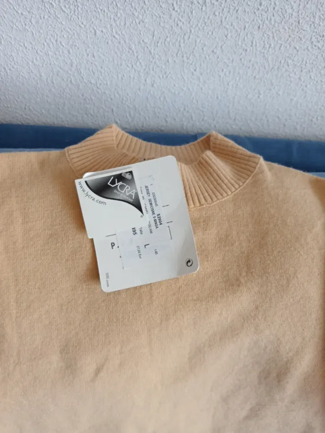 Chaleco beige de punto sin mangas