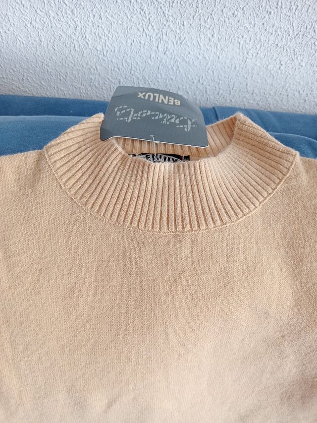 Chaleco beige de punto sin mangas