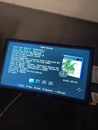 Consola Sony PS2 con mandos y accesorios completa.