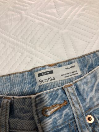 Pantalón vaquero campana desgastado