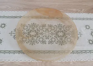 Piatto rotondo in vetro e polvere dorata