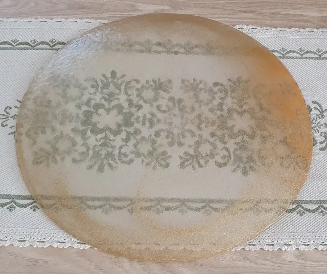 Piatto rotondo in vetro e polvere dorata