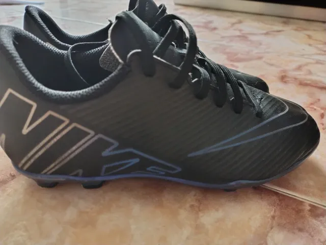 Botas de fútbol Nike tacos niño negras