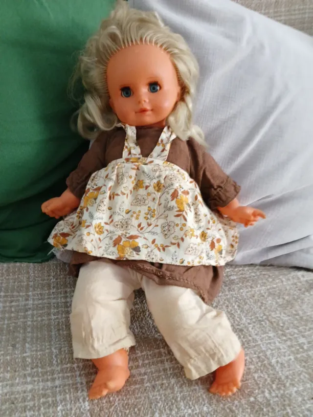 Muñeca antigua rubia ojos azules