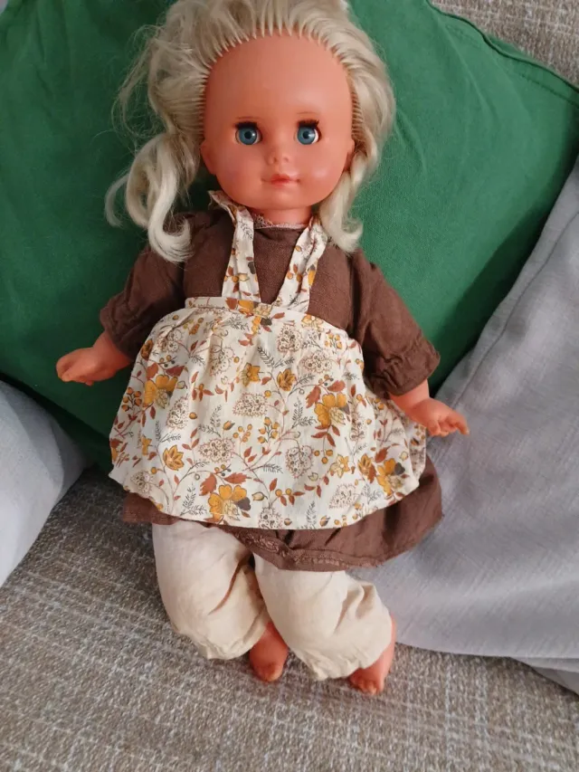 Muñeca antigua rubia ojos azules