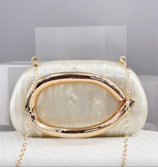 Bolso Clutch Zara Blanco y Dorado