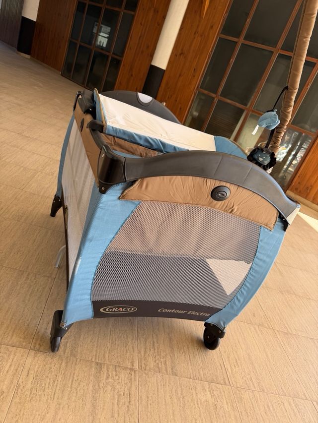 Cuna de viaje, dos alturas y cambiador