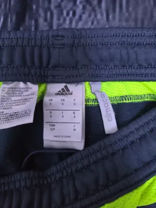 Pantalón chándal Adidas gris y amarillo