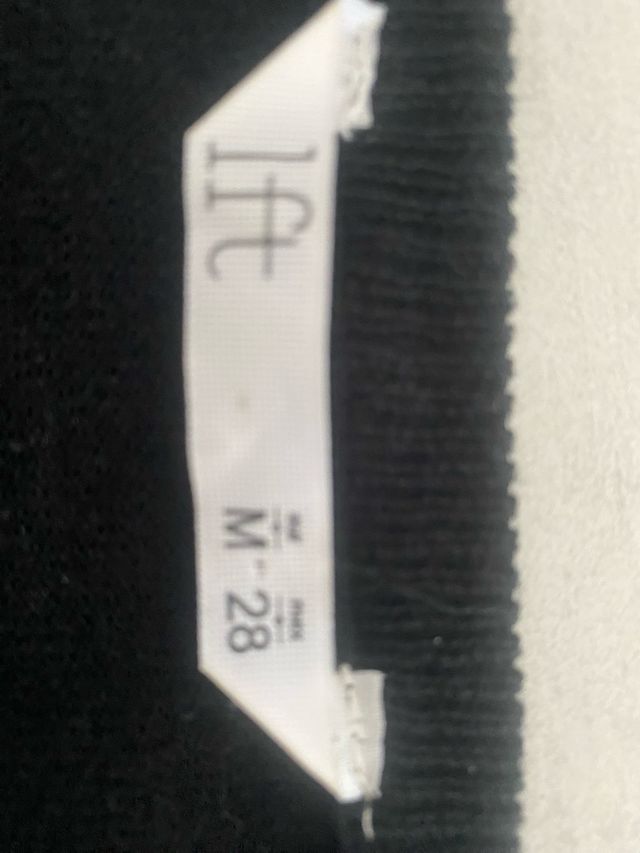 Rebeca negra con brillos