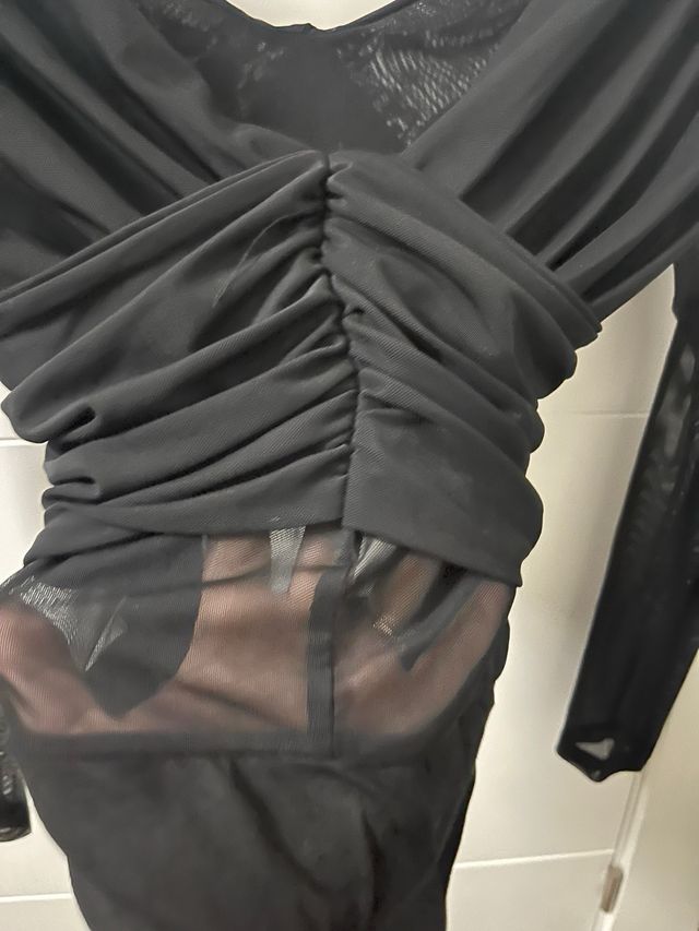 Elegante body negro manga larga transparente