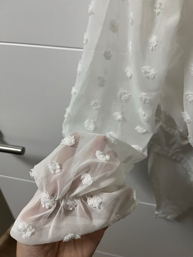 Blusa elegante blanca