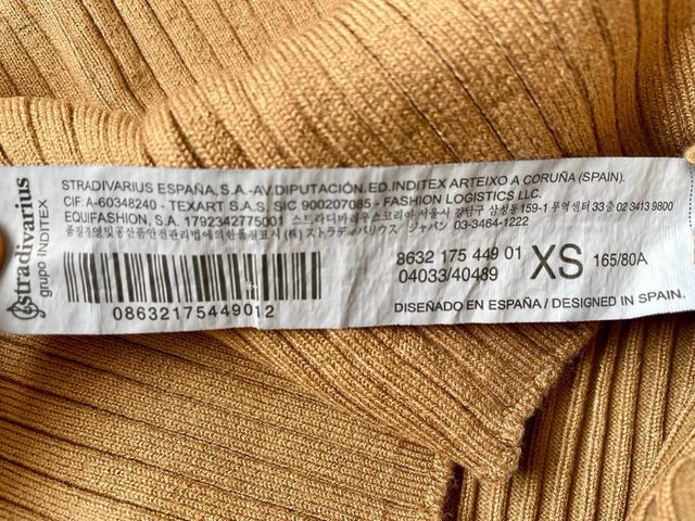 Top Stradivarius sin mangas cuello alto T.XS