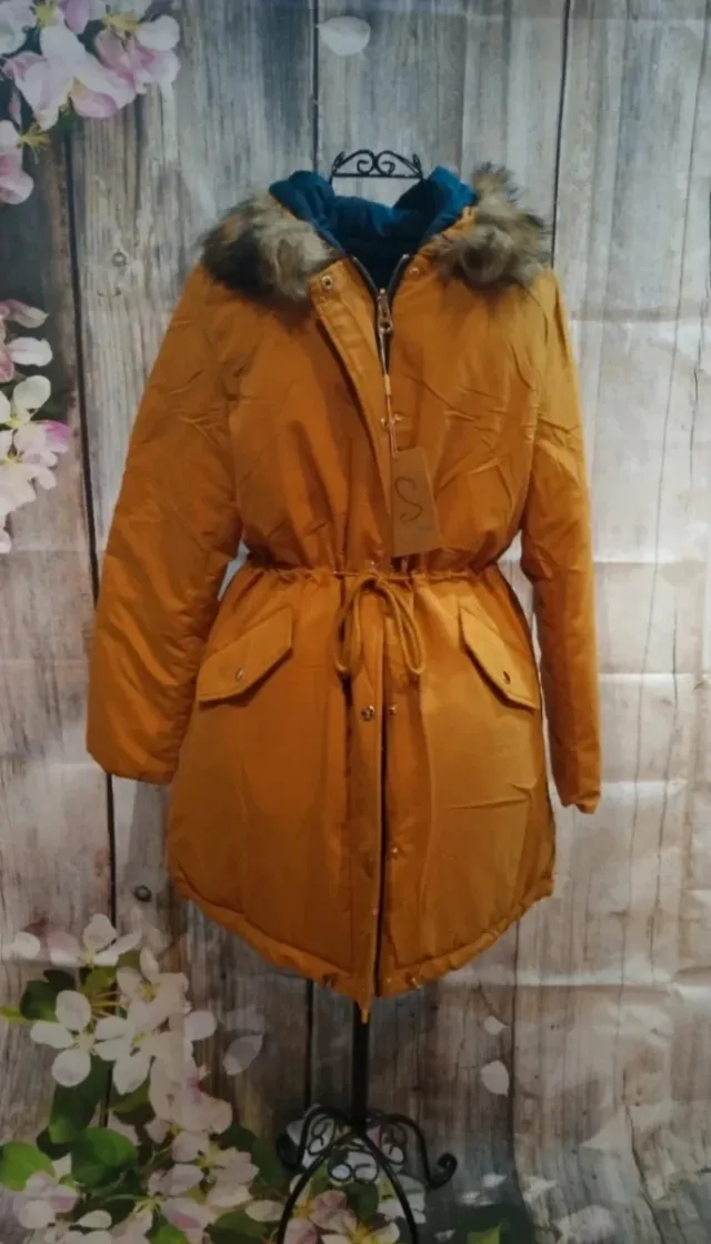 Abrigo reversible acolchado con capucha