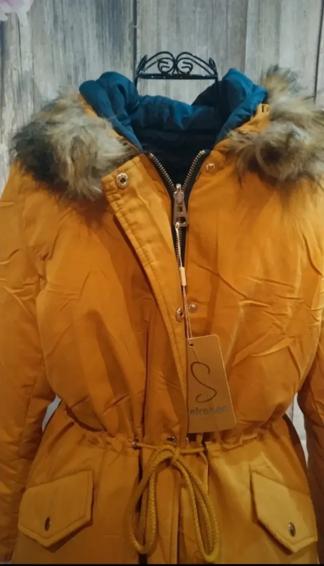 Abrigo reversible acolchado con capucha