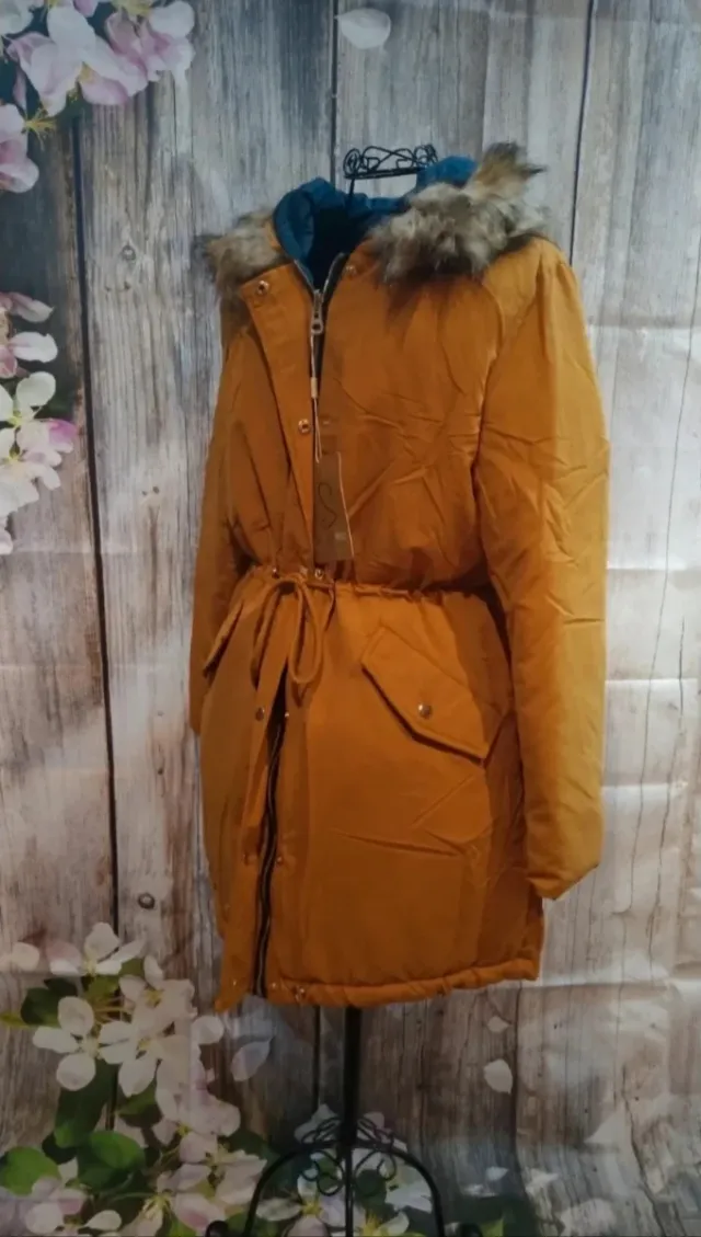 Abrigo reversible acolchado con capucha