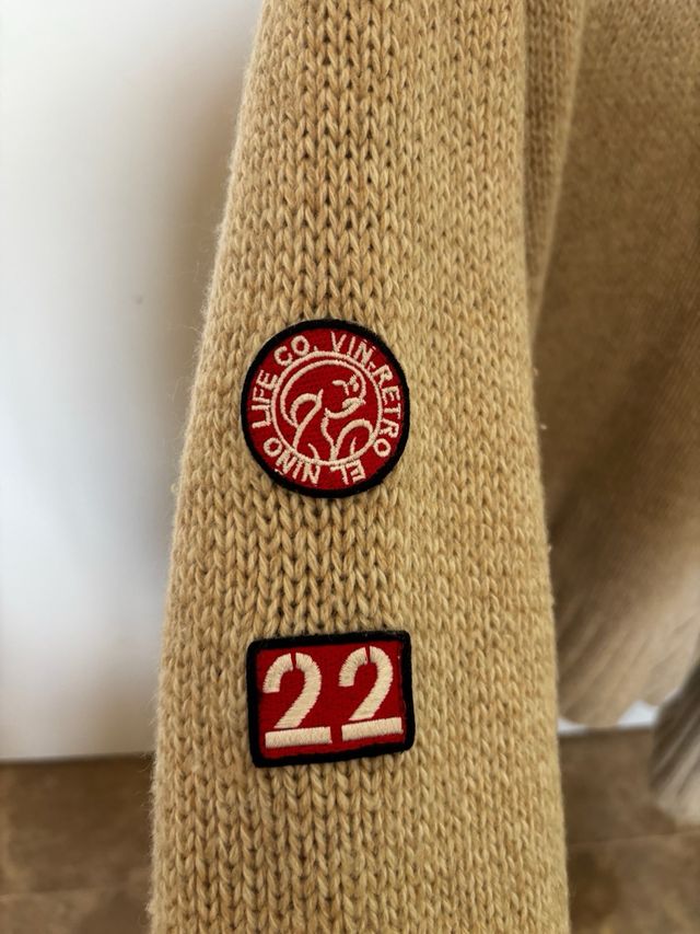 Abrigo de punto forrado