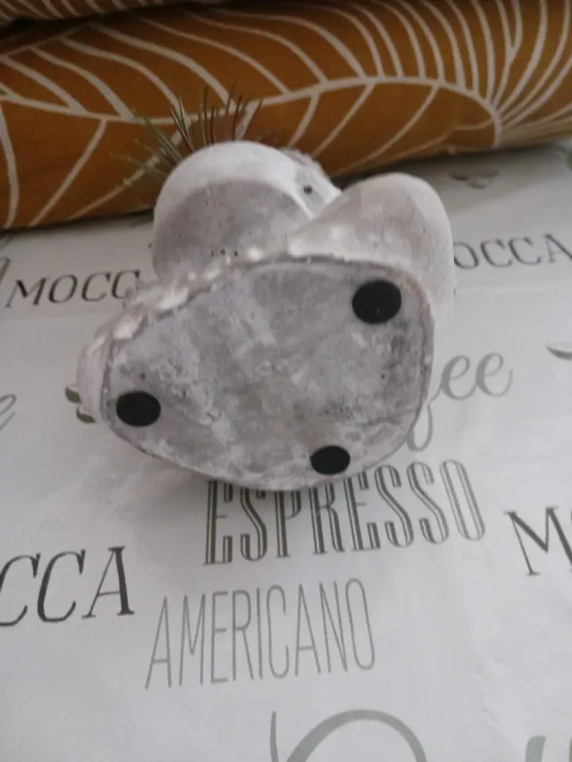 Figura Buda con planta pequeña